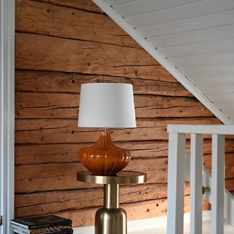 Pomarańczowa lampa stołowa w stylu mid century modern